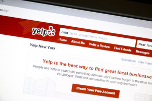 58779259 - yelp website on a computer screen.